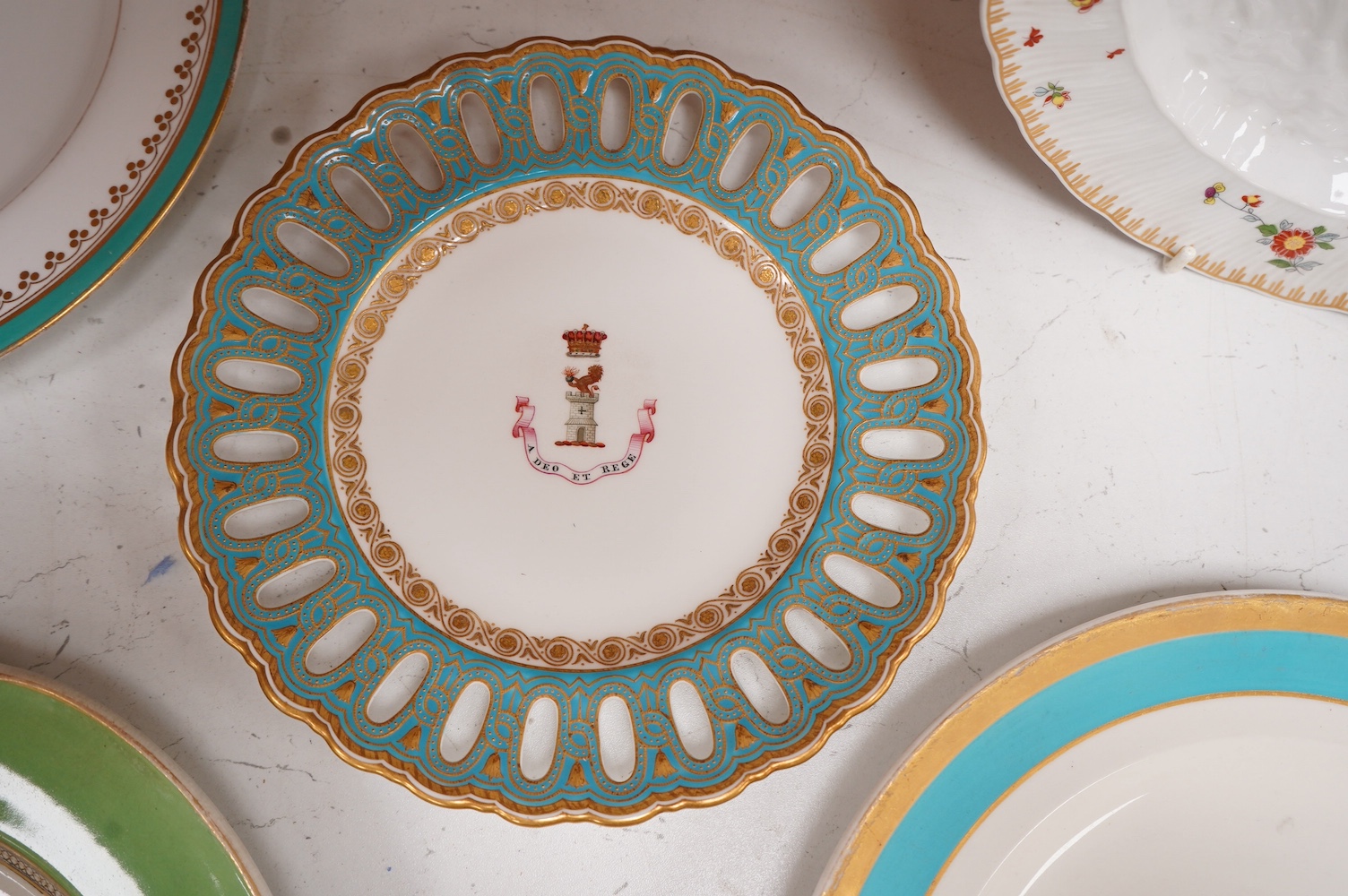 Five mixed 19th and 20th century armorial plates, including Royal Worcester, Spode and a Nelson Rockefeller collectors plate, largest 27cm diameter. Condition - two have gilded bands worn and one scratches to green glazi